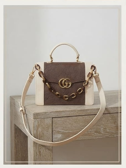 Brown and white handbag
