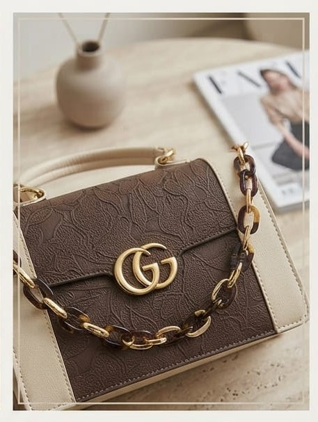 Brown and white handbag